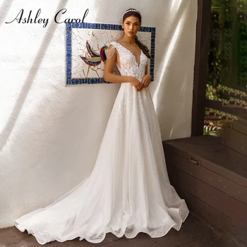 Ashley Carol A-Line düğün elbisesi 2022 Büyüleyici Backless Boncuklu Dantel Aplikler Kolsuz V Yaka Gelin Sparkly Plaj gelin kıyafeti